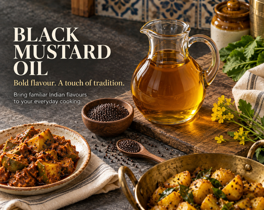 Black mustard seeds in a bowl with tempering spoon and hot oil